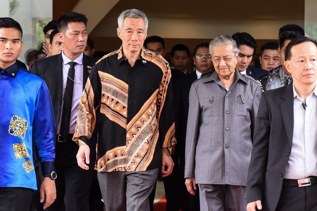 Singapore’s Prime Minister Lee Hsien Loong and Malaysia’s Prime Minister Mahathir Mohamad on May 19, 2018 in Putrajaya. Photo: AFP