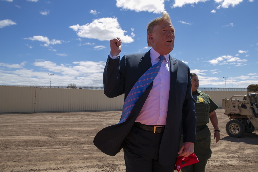 US President Donald Trump visits a refurbished section of the border wall with Mexico in Calexico, California, on Friday. Photo: AP