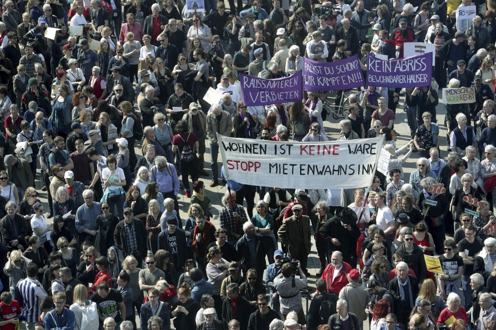 Protesters attend a demonstration against rent increase in Berlin. Photo: AP