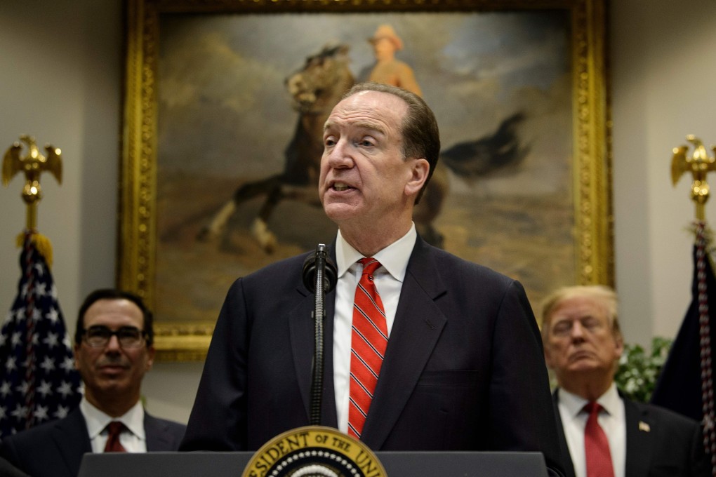 David Malpass speaks after US President Donald Trump (right) announced his candidacy to lead the World Bank during an event in the Roosevelt Room of the White House in February. On the left is Treasury Secretary Steve Mnuchin. Photo: AFP