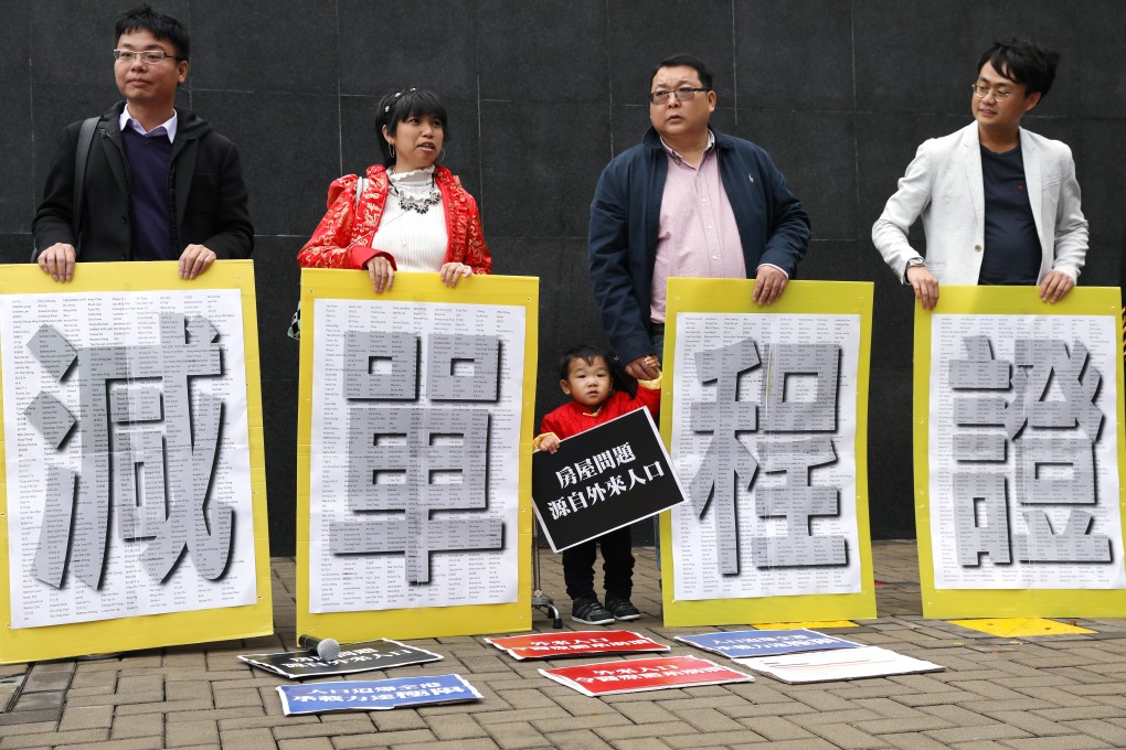 District councillors and other Hongkongers take part in a protest on February 10 against the one-way permit scheme allowing mainlanders to settle in Hong Kong. The current debate only focuses on the negatives of the scheme, ignoring the positives. Photo: Nora Tam