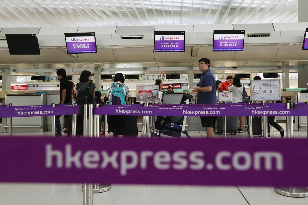 Passengers check in at Hong Kong International Airport. Photo: SCMP Pictures