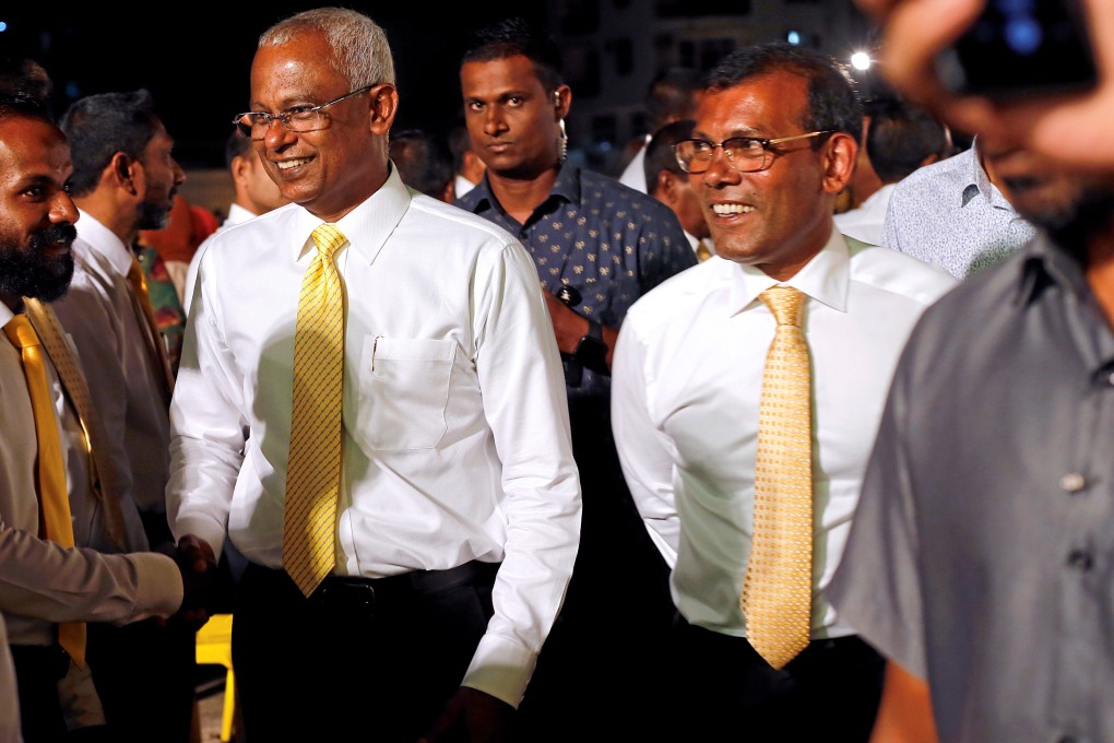 Maldives President Ibrahim Mohamed Solih and former president Mohamed Nasheed arrive at an election campaign rally in Male on April 4, 2019. Photo: Reuters