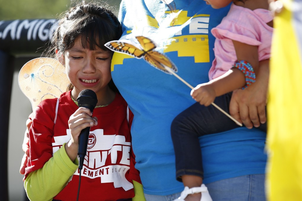 Akemi Vargas, 8, cries as she talks about being separated from her father during an immigration family separation protest in front of the Sandra Day O'Connor US District Court building in June 2018. Photo: AP