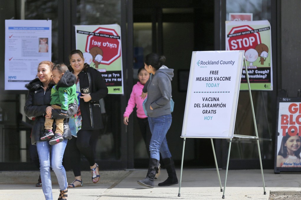 Signs advertising free measles vaccines at the Rockland County Health Department, in Pomona, New York. Photo: AP