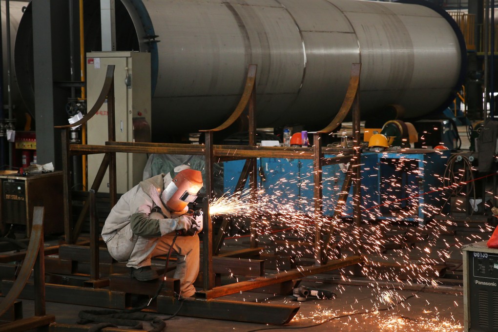 An employee works on an LNG tank at an energy equipment firm in Jiangsu province. China’s gas demand is expected to rise by 30 billion to 40 billion cubic metres this year. Photo: Reuters