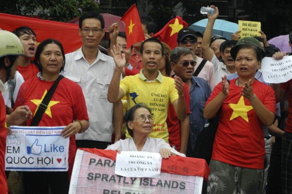 People in Hanoi protest over China’s 2012 announcement that it will open nine oil and gas lots in waters in the South China Sea. Photo: AP