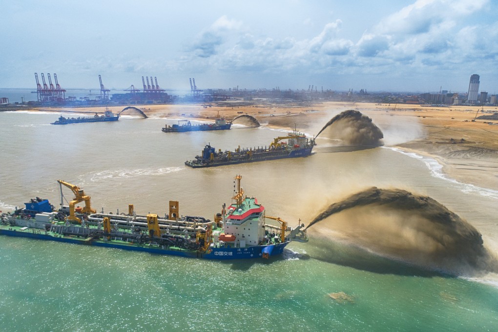 Chinese dredgers work at the construction site of the Colombo Port City project in Sri Lanka in this June 2018 file photo. Ostrum Asset Management is looking at opportunities to fund infrastructure projects in Asia. Photo: Xinhua