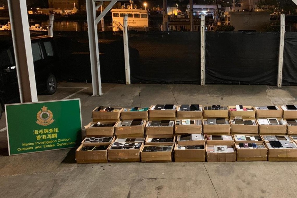 Police and customs found 36 boxes of electronic products, including second-hand mobile phones, computer tablets and electronic components. Photo: Handout