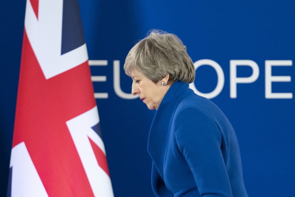British Prime Minister Theresa May leaves a news conference following an EU leaders’ summit in Brussels on April 11. International investors cannot say they have not been warned of the damage that a no-deal Brexit would wreak on the UK and European economies. Photo: Bloomberg