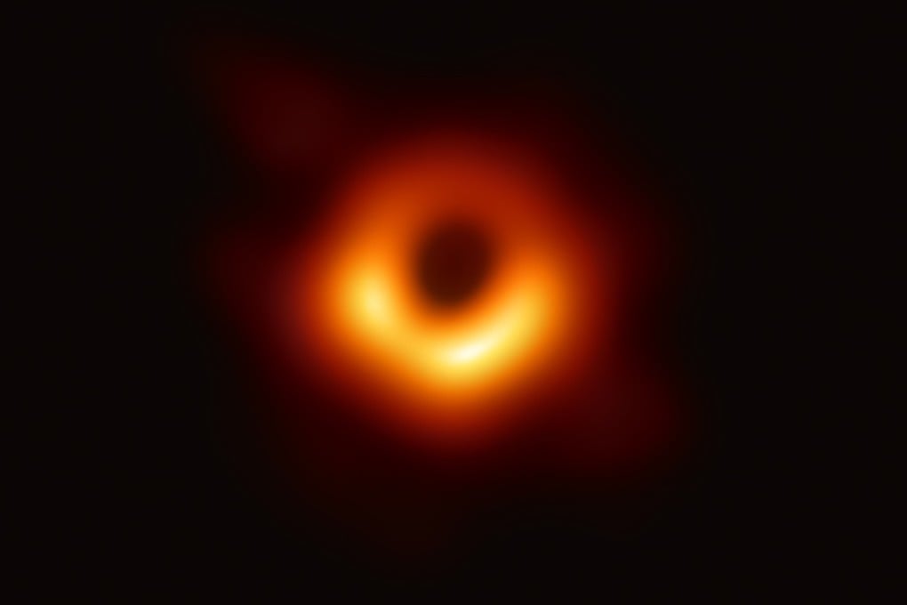 A handout photo provided by the European Southern Observatory shows the first photograph of the black hole at the centre of Messier 87, a massive galaxy in the nearby Virgo galaxy cluster. Photo: AFP