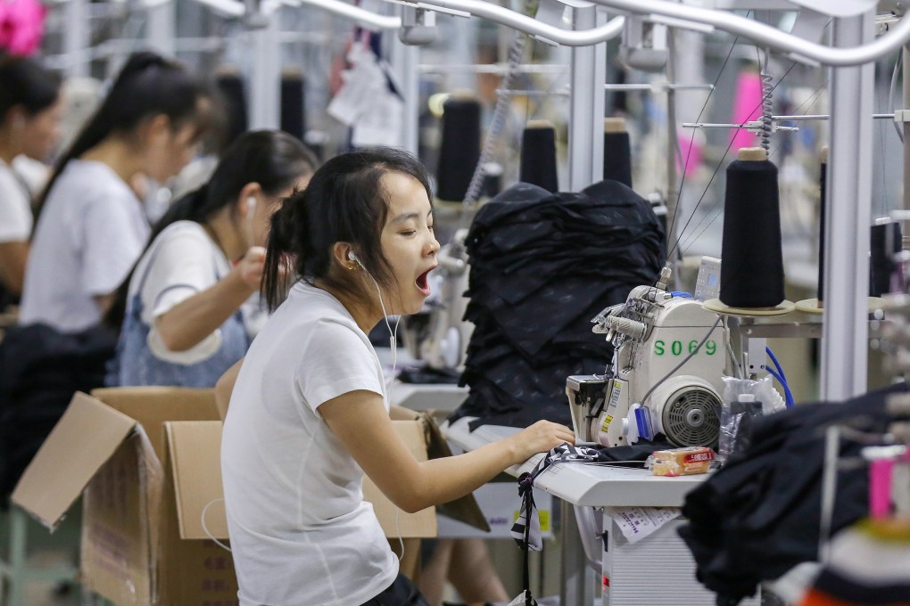Workers make swimwear at a factory in Yinglin town in China’s eastern Fujian province in August 2018. Photo: AFP