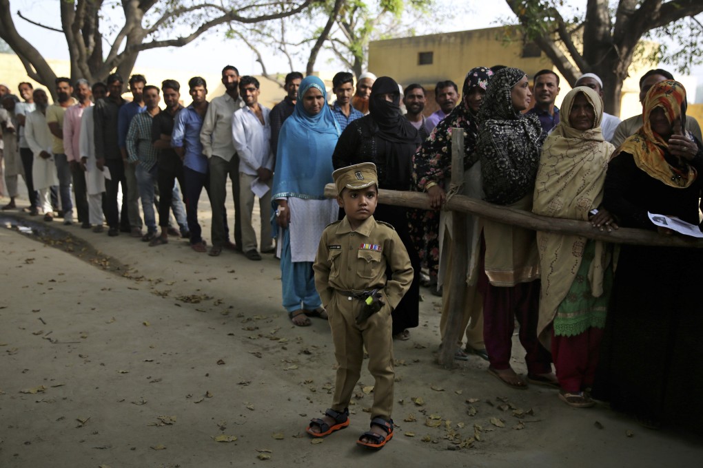 Indians wait to cast their votes in Uttar Pradesh. Photo: AP