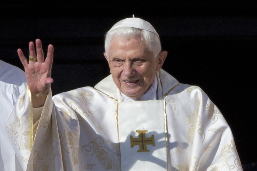 Pope Emeritus Benedict XVI arrives in St. Peter's Square at the Vatican on October 19, 2014. Photo: AP