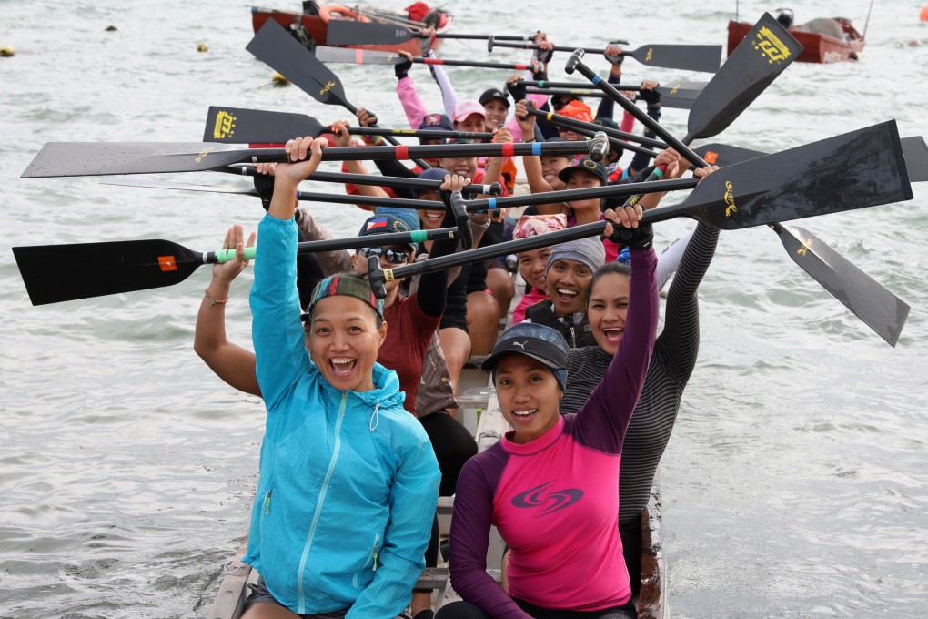 The Filipino Dynamos dragon boat team, which is made up of Hong Kong domestic helpers, during a training session at Stanley main beach. Photo: Nora Tam
