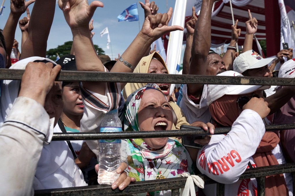 Supporters shout and gesture during a campaign rally for Prabowo Subianto. Photo: Bloomberg
