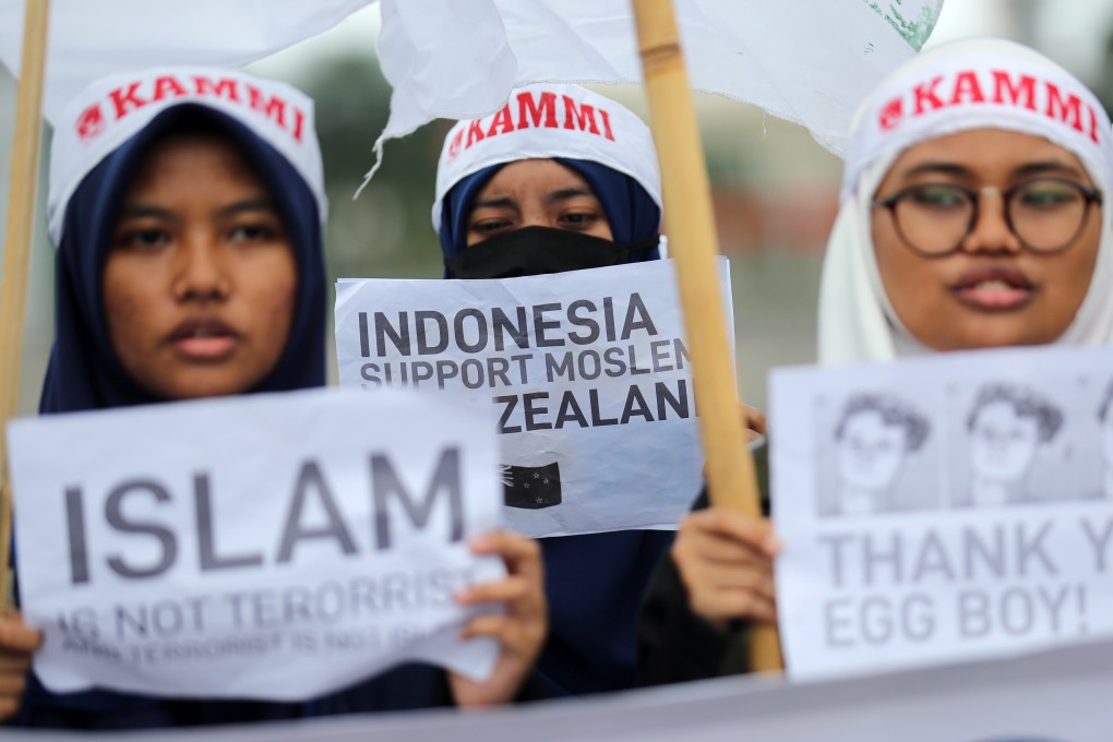 Indonesian Muslim students show their support for victims of the mosque shootings in New Zealand. Photo: EPA-EFE/Bagus Indahono