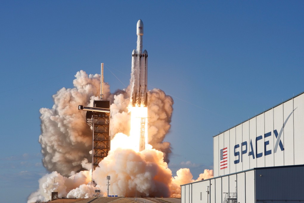 A SpaceX Falcon Heavy rocket, carrying the Arabsat 6A communications satellite, lifts off from the Kennedy Space Centre in Cape Canaveral, Florida on April 11, 2019. Photo: Reuters
