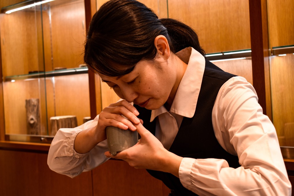 Nae Anri, 41, an incense listening expert who runs ceremonies at Yamada Matsu Incense Wood, demonstrates the ancient Japanese art of incense listening. Photo: Lucy Dayman