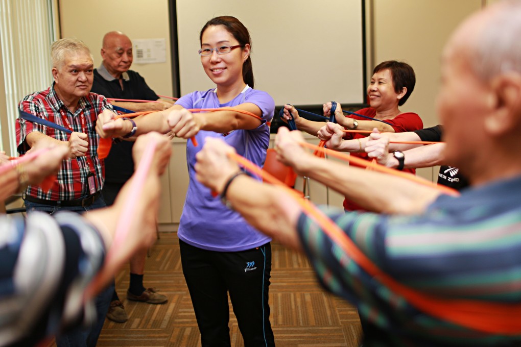 Dementia patients take part in strength-training exercises as part of a memory clinic run by Khoo Teck Puat Hospital. Photo: Khoo Teck Puat Hospital
