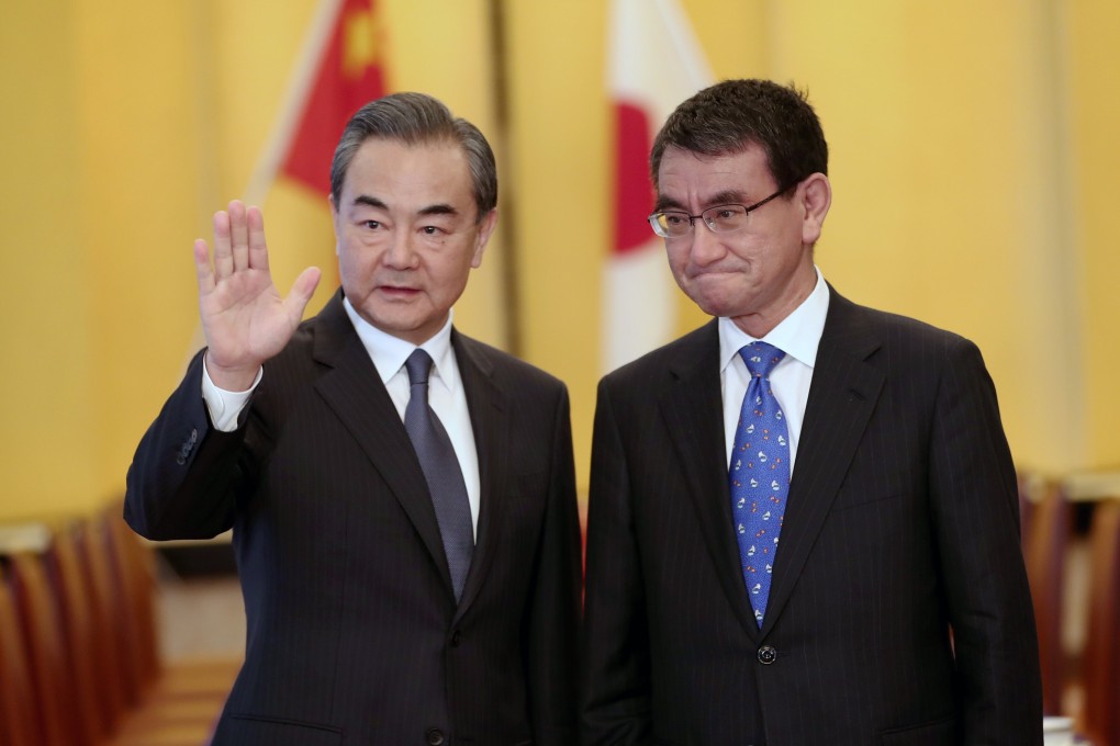 Chinese Foreign Minister Wang Yi (left) and his Japanese counterpart Taro Kono will meet for talks in Beijing on Sunday. Photo: EPA-EFE