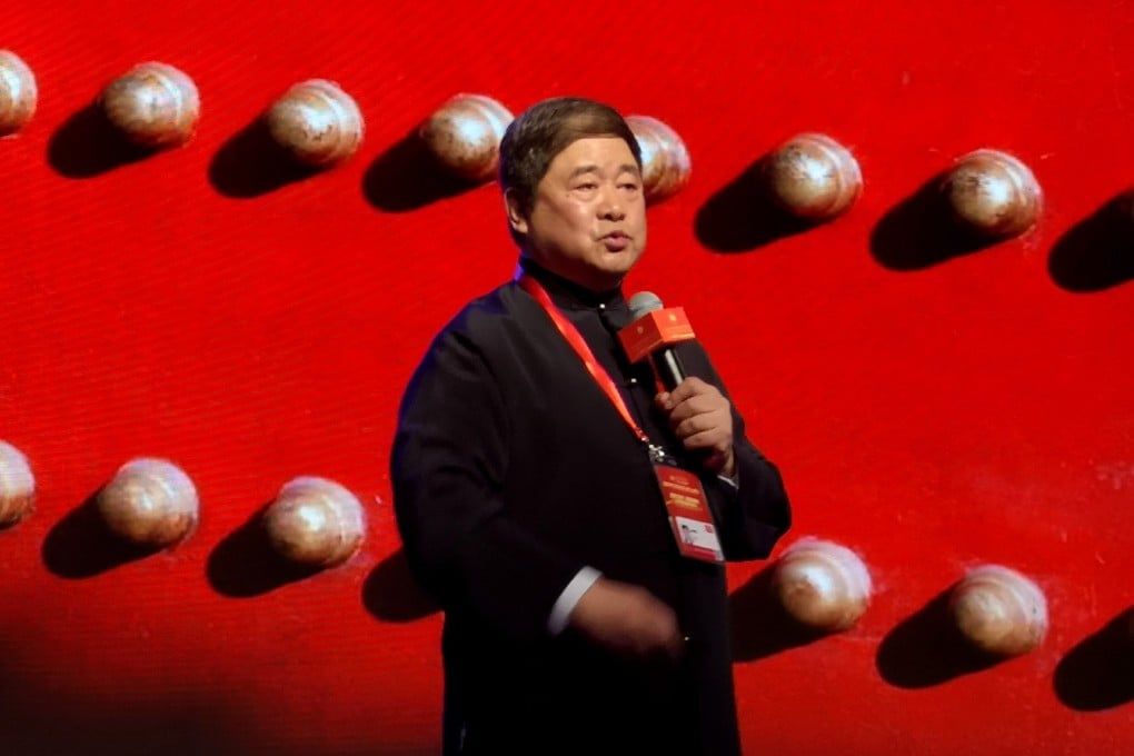 Shan Jixiang gives a speech at the Palace Museum shortly before his retirement. Photo: Xinhua