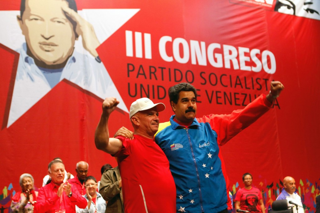 Venezuelan President Nicolas Maduro welcomes ex-Venezuelan Army intelligence head Hugo Carvajal during a congress of the ruling Venezuelan United Socialist Party in Caracas, Venezuela, in 2014. Carvajal has since spoken up in favour of Maduro’s rival, Juan Guaido. Photo: handout via EPA-EFE