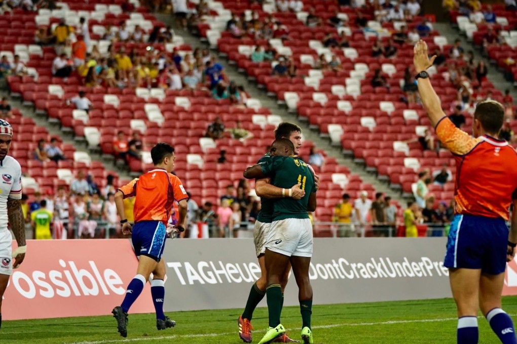 South Africa celebrate Singapore Sevens victory. Photo: World Rugby