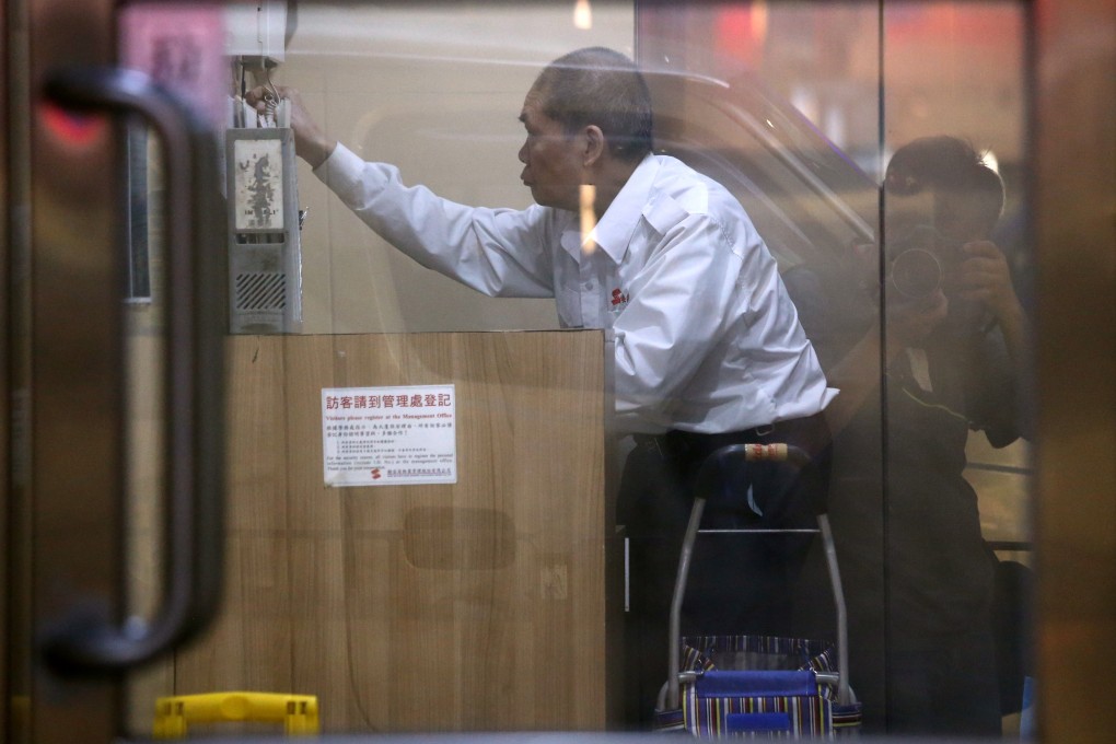 Security guards are the most likely of Hong Kong workers to put in long hours. Photo: Dickson Lee