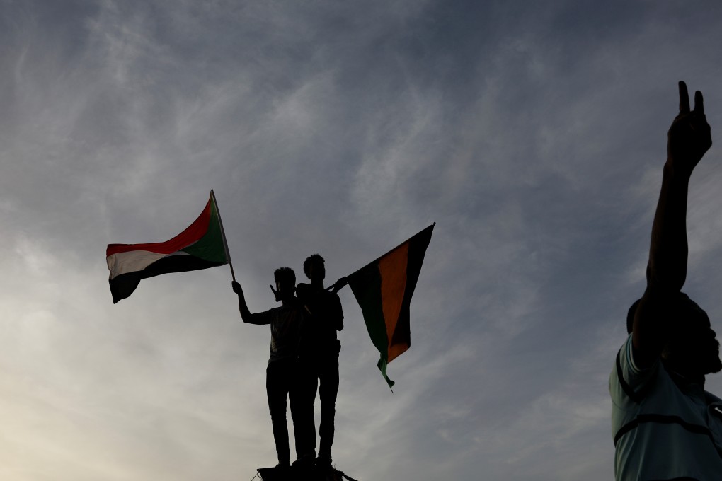 Sudanese demonstrators protest outside the Defence Ministry in Khartoum. Photo: Reuters