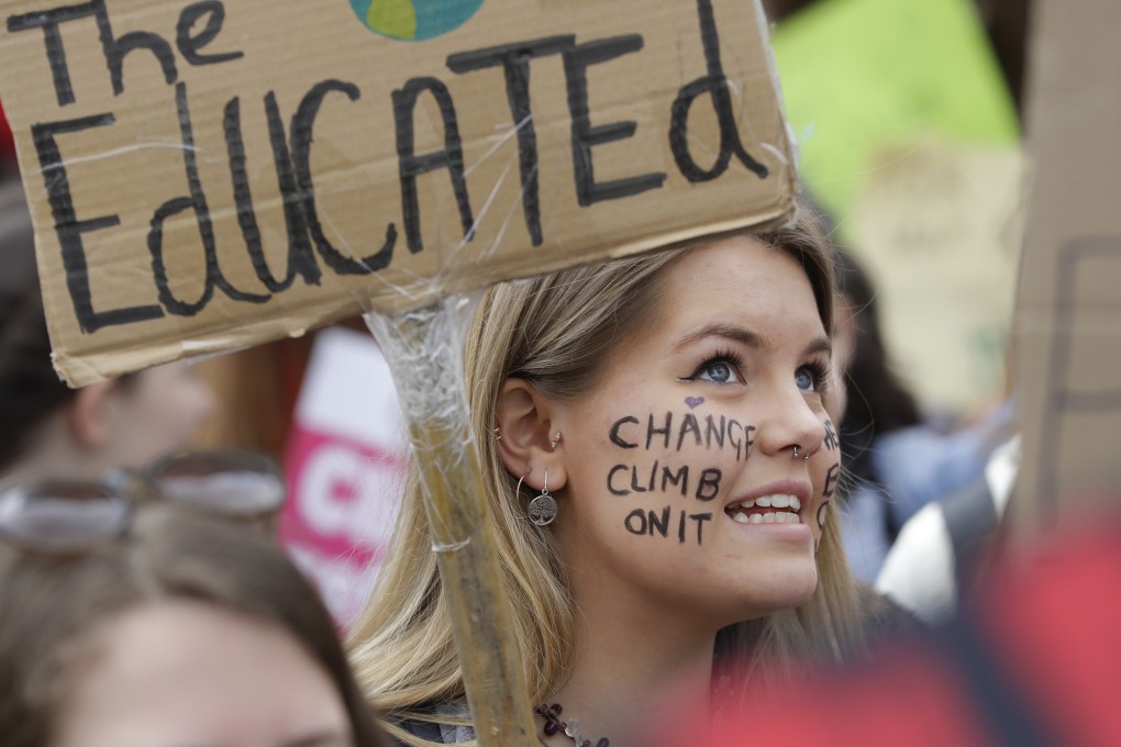 A demonstrator shouts during a protest near Parliament in London, Friday, April 12. Photo: AP Photo