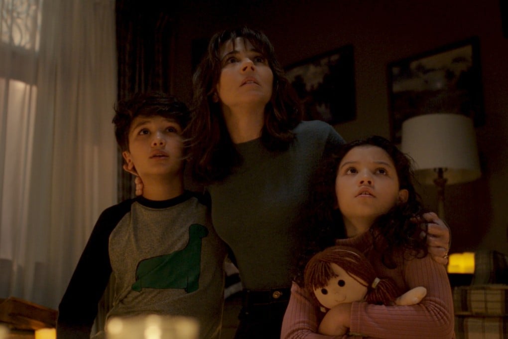(From left) Roman Christou, Linda Cardellini and Jaynee-Lynne Kinchen in a scene from The Curse of La Llorona (category: IIB), directed by Michael Chaves.