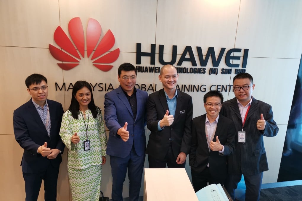 Dr Ong Kian Ming, deputy minister of international trade and industry (third from right), at Huawei’s global training centre in Malaysia. Photo: Handout