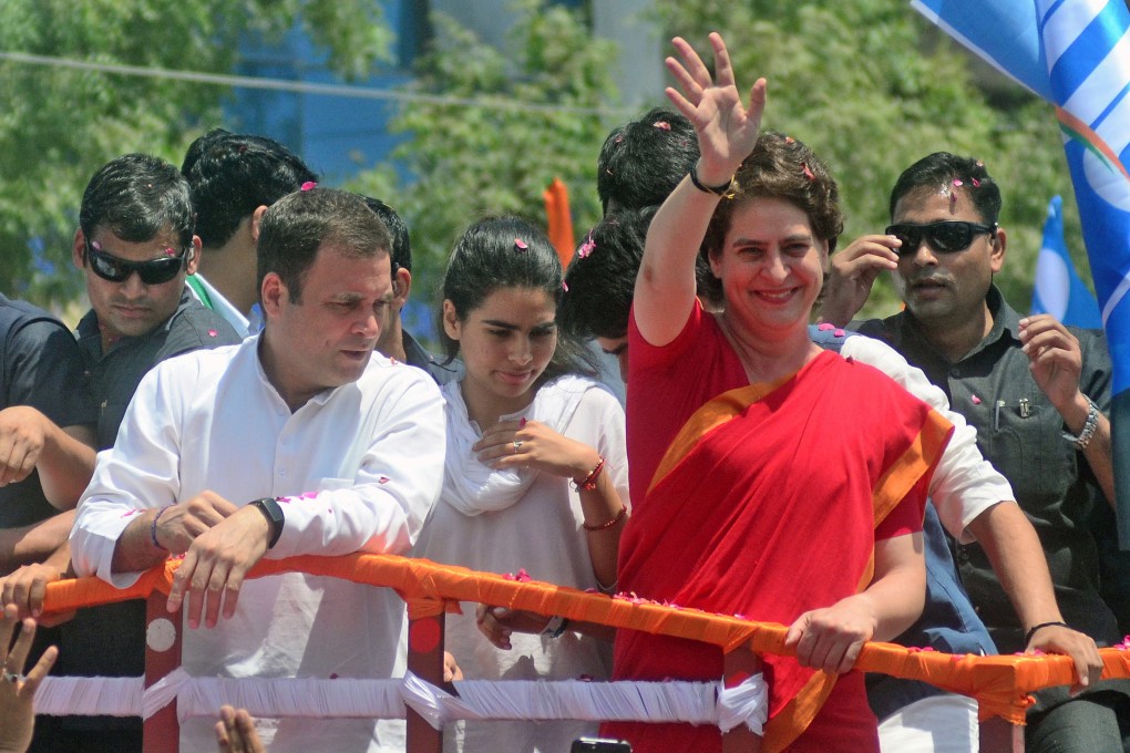 President of the opposition Congress party, Rahul Gandhi (left) with his sister and party member Priyanka Gandhi, during a road show on the way to filing his election nomination in Amethi, Uttar Pradesh, on April 10. Elections for India’s 545-member lower house of parliament are being held in seven phases between April 11 and May 19, 2019. Photo: EPA-EFE