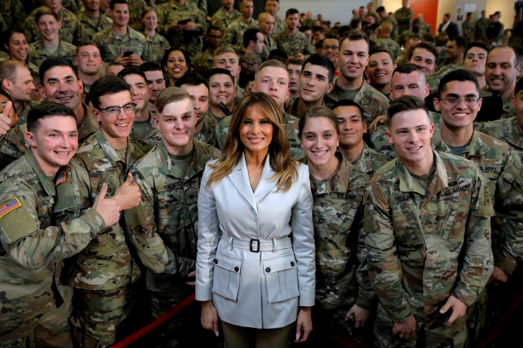 US first lady Melania Trump poses with soldiers during a visit to Fort Bragg in Fayetteville, North Carolina on April 15, 2019. Photo: Reuters