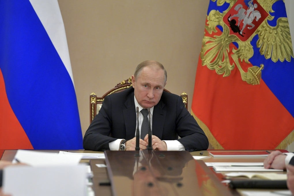 Russian President Vladimir Putin chairs a Cabinet meeting in the Kremlin. Photo: Kremlin Pool Photo via AP