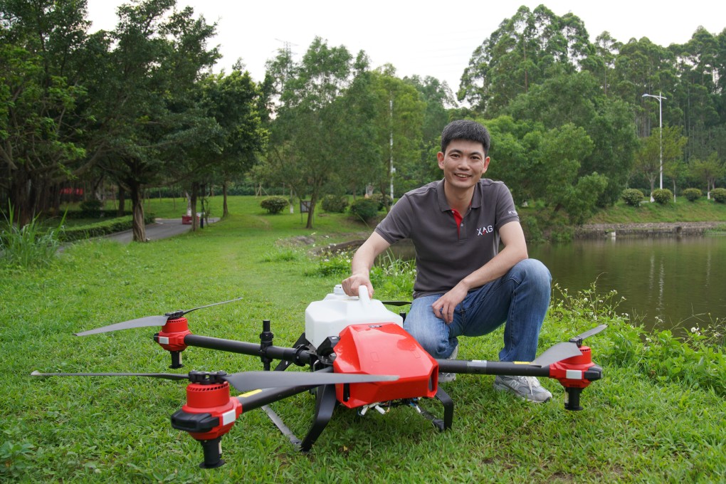 Peng Bin of XAG poses with one of his drones. Photo: Lea Li