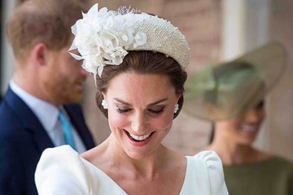 Catherine, the Duchess of Cambridge, wears a cream appliqué headband by Jane Taylor at Prince Louis’ christening in July last year. Photo: AFP
