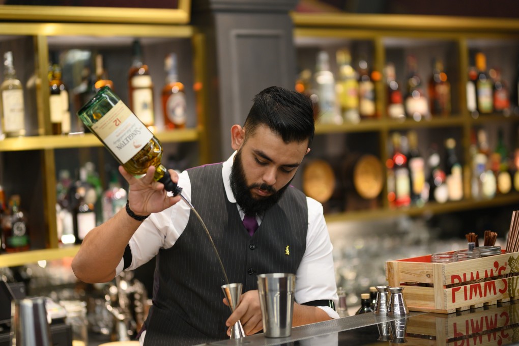 A bartender at The Monarchy, Singapore.