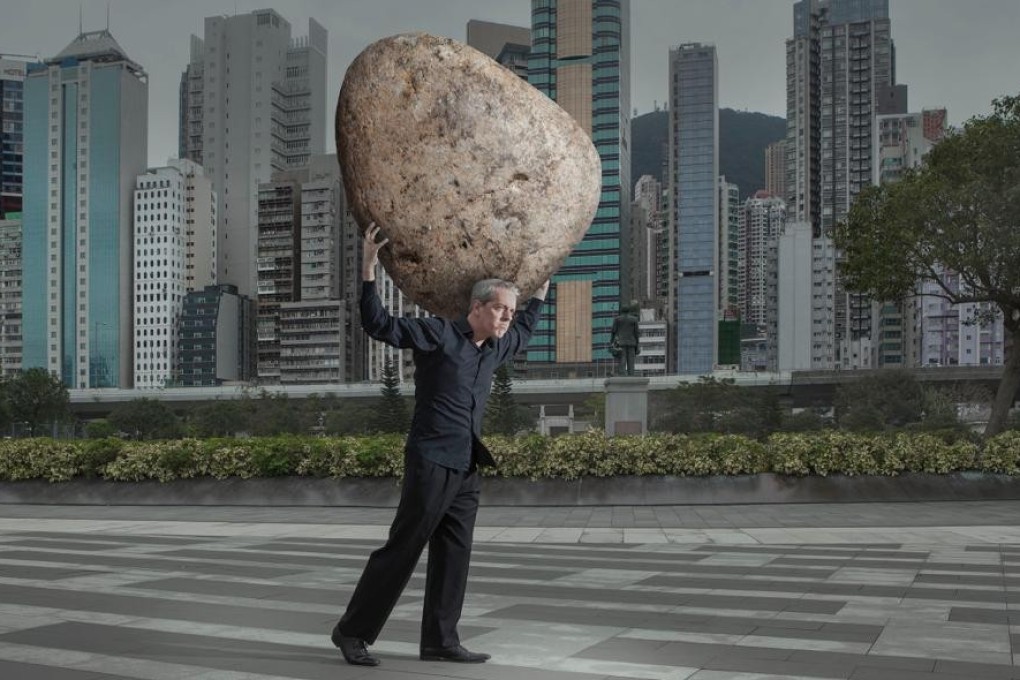 Artists Bex and Nic Gaunt’s project to raise awareness about mental health in Hong Kong shows images of people holding giant stones as a metaphor for the weight that sufferers of mental illness must carry each day. Photo: Bex and Nic Gaunt