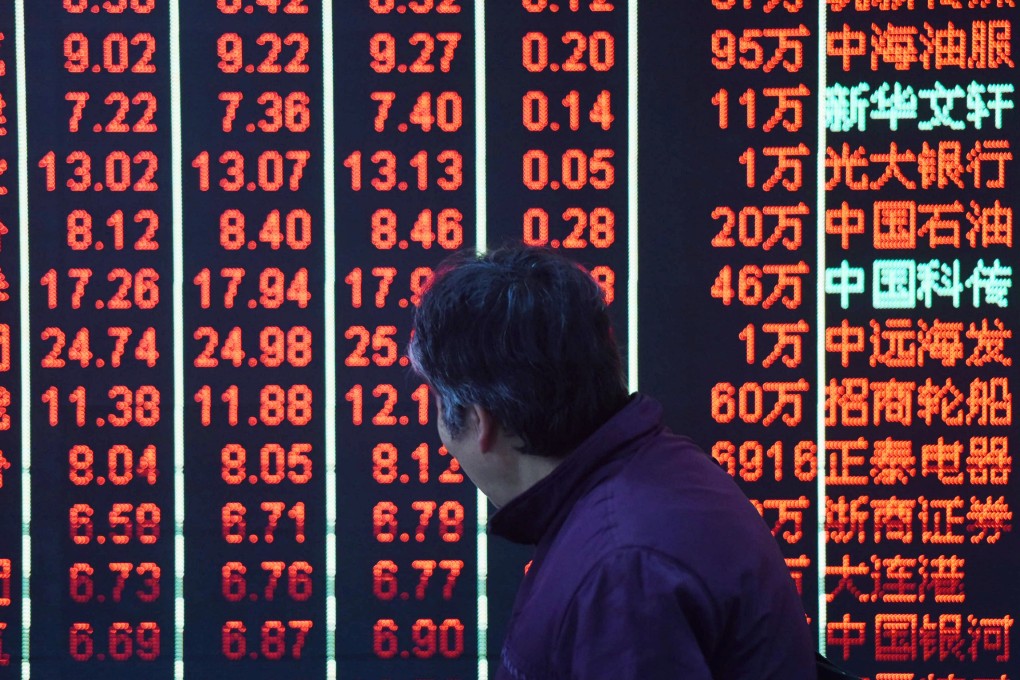 Traders said upbeat quarterly data bolstered sentiment that growth momentum had bottomed, helping push the Shanghai Composite Index to a one-year high on Wednesday. Photo: Xinhua