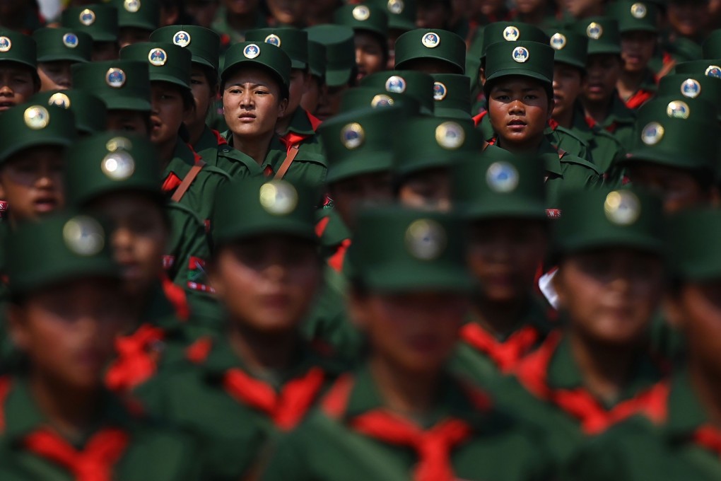 United Wa State Army (UWSA) soldiers participate in a military parade, to commemorate 30 years of a ceasefire signed with the Myanmar military in the Wa State. Photo: AFP