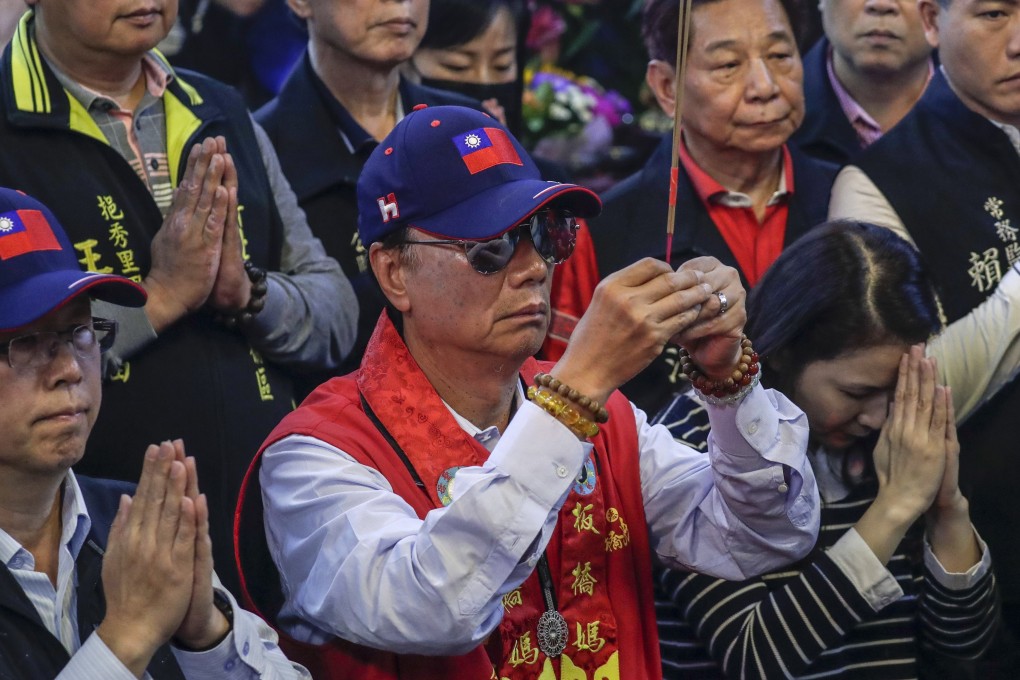 Foxconn founder Terry Gou prays at a temple in New Taipei City, Taiwan, on Wednesday. Photo: EPA-EFE