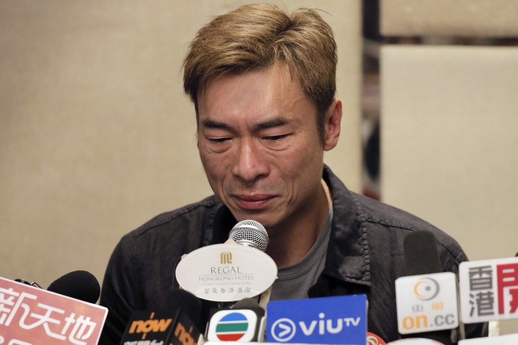 Hong Kong singer Andy Hui apologises after footage of him getting intimate with TV actress Jacqueline Wong in the back of a vehicle was published. The incident has put the spotlight on privacy protection amid growing use of dashboard cameras inside vehicles. Photo: AP