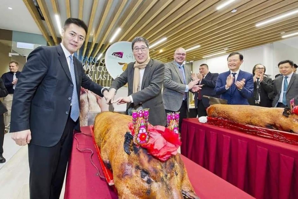 Two roast pigs were served at the opening ceremony of CityU’s new veterinary centre on April 3. Photo: Facebook