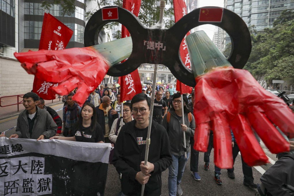 Pan-democrats march from Wan Chai to the government’s headquarters in Tamar, Admiralty, to oppose the government’s proposal on amending the law on the transfer of fugitives on March 31. Photo: Winson Wong