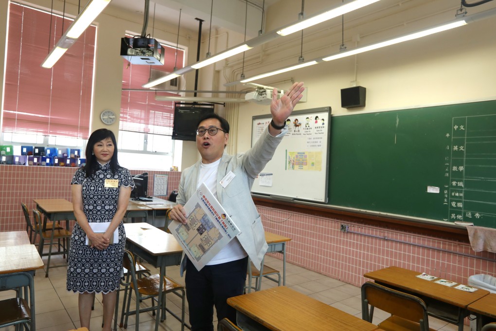 Left to right: Jackeline Yang, chairwoman of Lok Sin Tong Benevolent Society (Kowloon); and Yuen Kwok-cheung, architect and consultant, at Lok Sin Tong Primary School in Kowloon City, where the charity will develop 50 flats for households with three or four family members. Photo: Xiaomei Chen