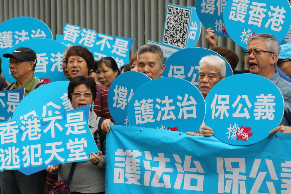 Supporters of the government’s plan to amend the Fugitive Offenders Ordinance and the Mutual Legal Assistance in Criminal Matters Ordinance call for justice and the rule of law to be upheld, in Admiralty on April 17. Photo: Dickson Lee