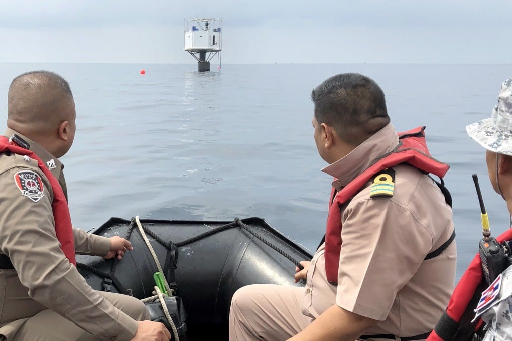 Thai naval officers inspecting a 'seastead' in the Andaman Sea. Photo: EPA-EFE