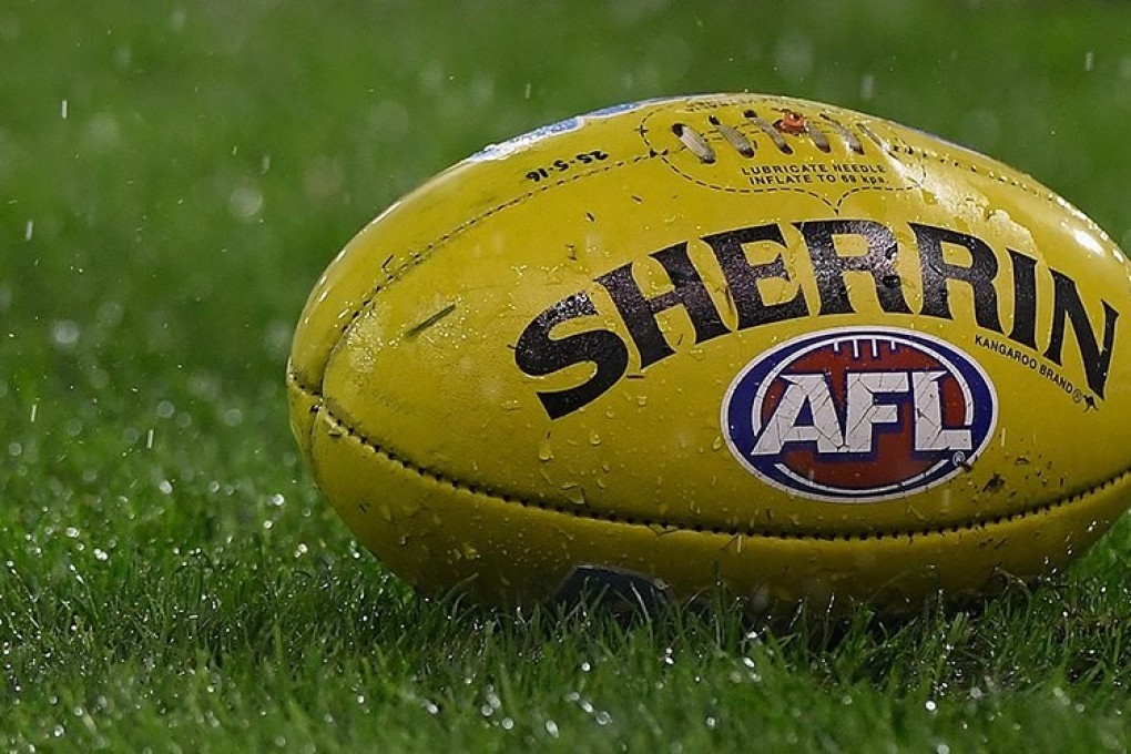 An official Australian Rules football ahead of a game. Photo: Port Adelaide Power/Gold Coast Suns